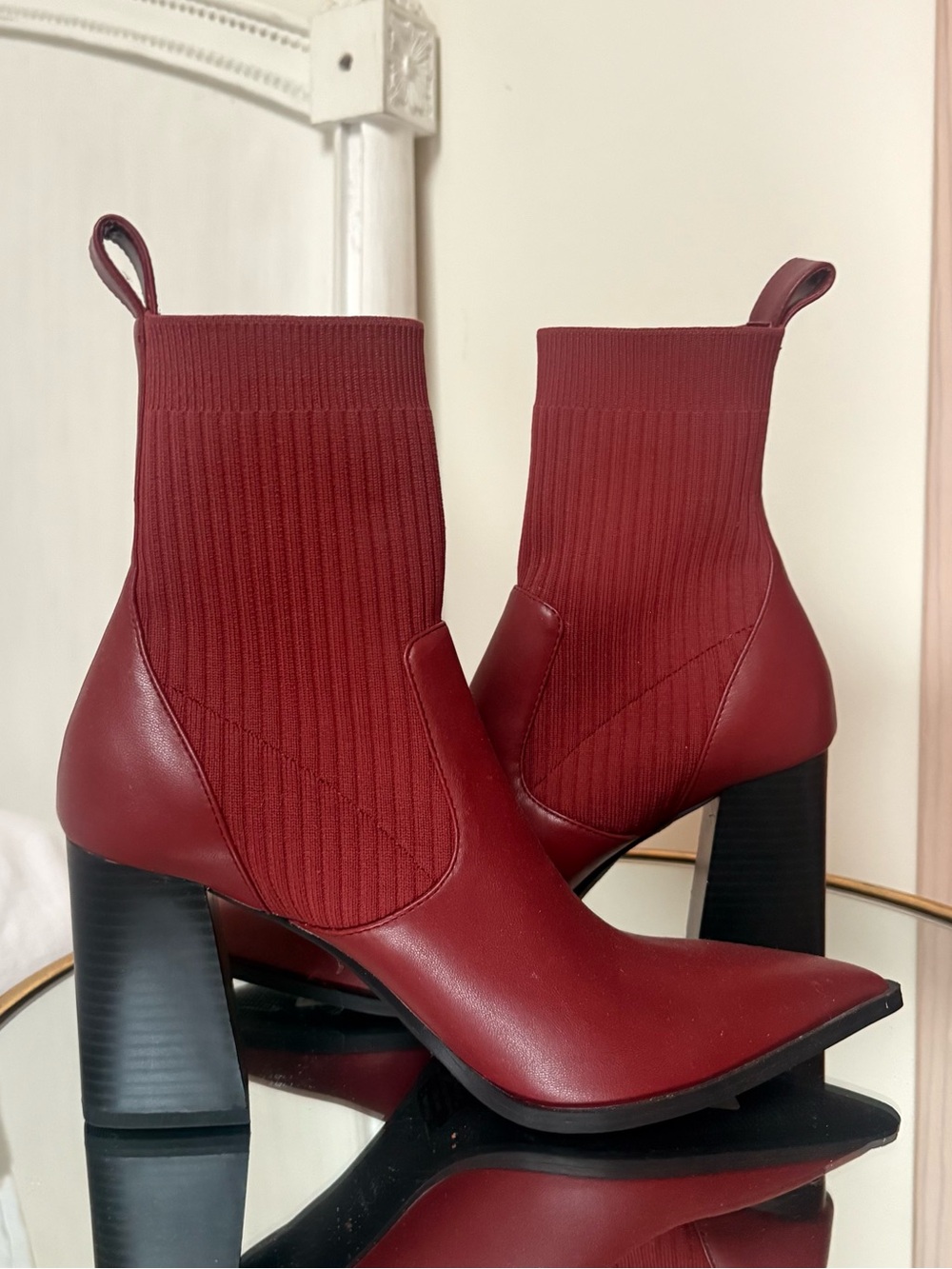 Red leather heeled ankle, pointed toe boots. Never worn. NWT